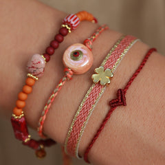 Pulsera tejida trébol ladrillo