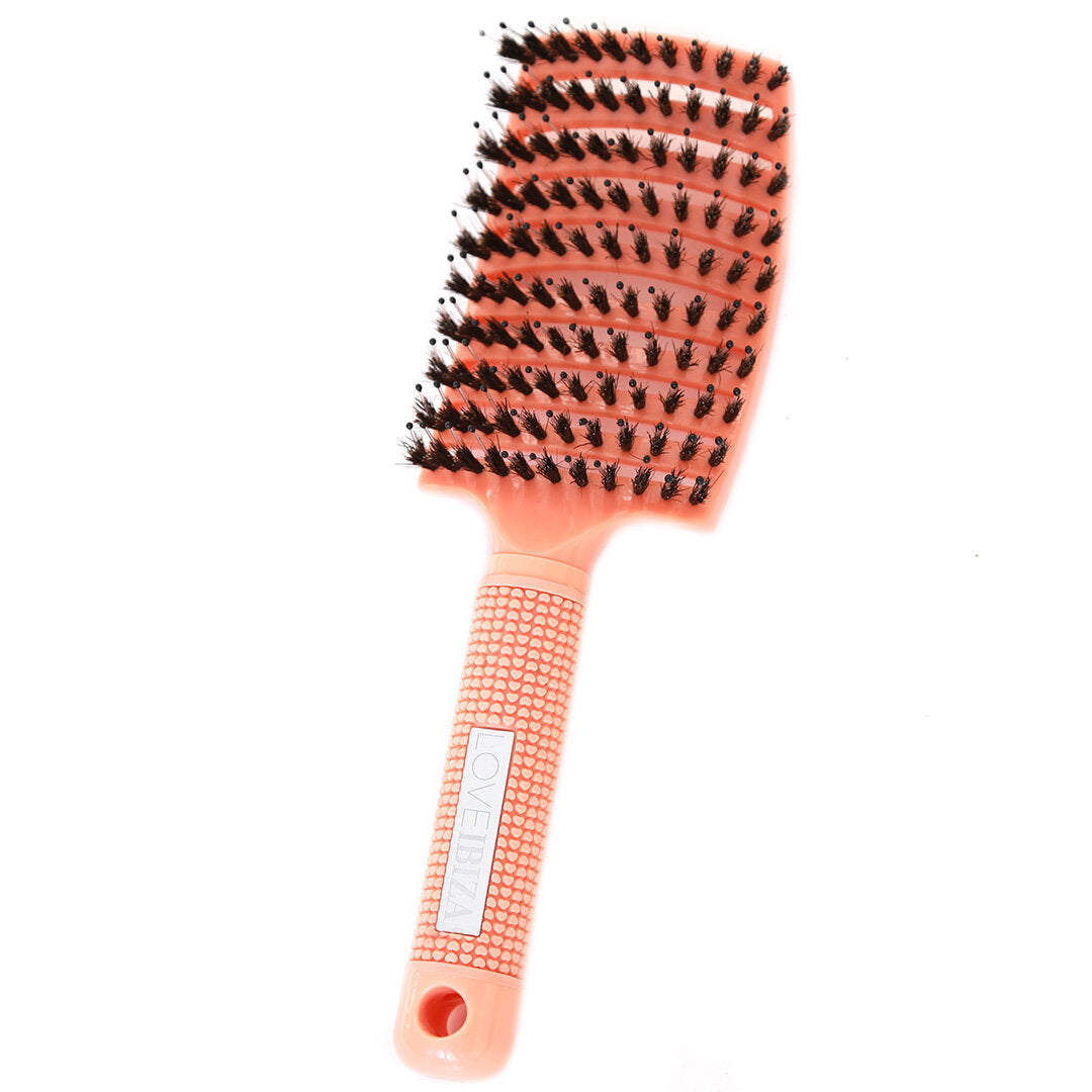 Cepillo antienredos para el cabello color melocotón