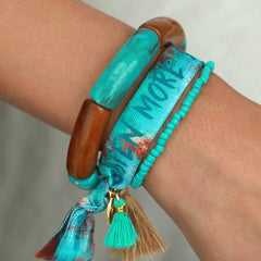 Brazalete pluma marrón turquesa