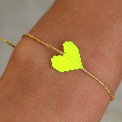 Brazalete corazón amarillo neón