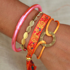 Pulsera tejida flor naranja